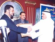 الدكتور الشميري والشاعر سعود البابطين وسفير الكويت أحمد خالد الكليب